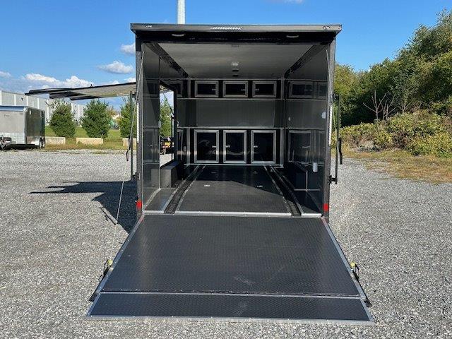 Covered-Wagon-8.5-x-24-Enclosed-Car-Trailer-Finished-Interior-Escape-Door-Cabinets-Black-Trim-Package-1.jpg