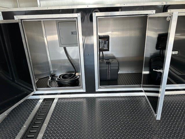 Covered-Wagon-8.5-x-24-Enclosed-Car-Trailer-Finished-Interior-Escape-Door-Cabinets-Black-Trim-Package-6.jpg