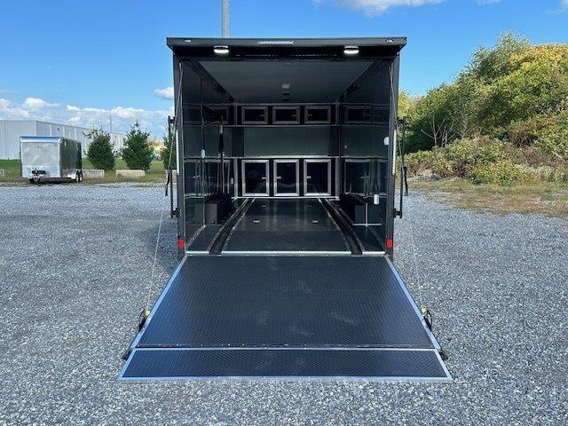 Covered-Wagon-8.5-x-24-Enclosed-Car-Trailer-Finished-Interior-Escape-Door-Cabinets-Black-Trim-Package-7.jpg